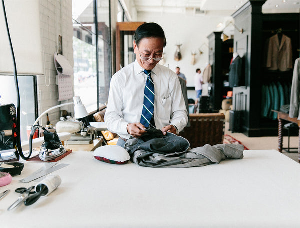 Tinoy tailoring a navy blazer